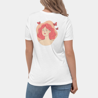 On-model back view wearing white tee with peach-oval woman portrait and butterflies, clean studio wall.