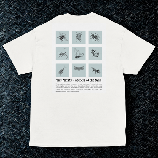 Back view of white tee with 3×3 insect sketch grid and Tiny Giants—Keepers of the Wild title and paragraph, dark woven backdrop.
