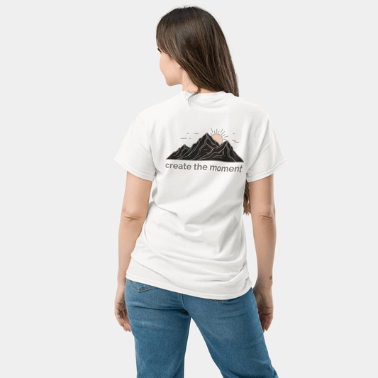 back view of the creatpix “create the moment” t-shirt with a minimalist mountain sunrise graphic on the back