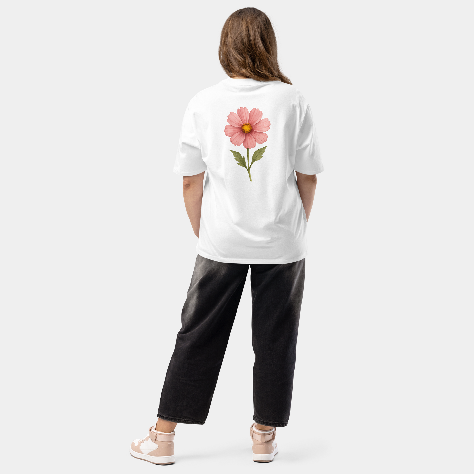 model wearing oversized blooming cosmos t-shirt (white) by creatpix