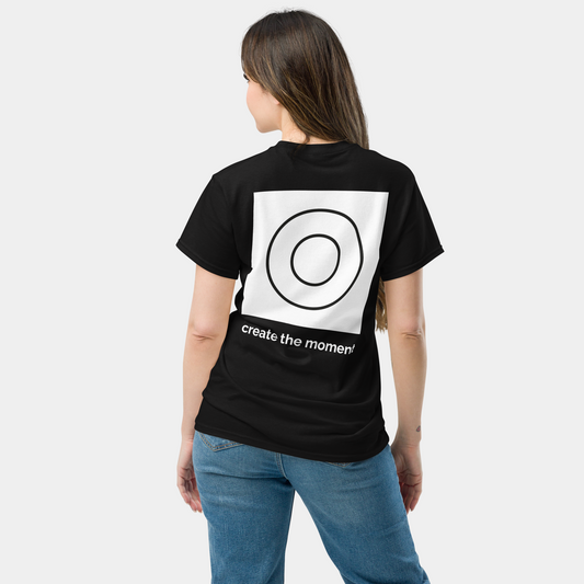 back view of woman in black t-shirt with small logo – now 15% off