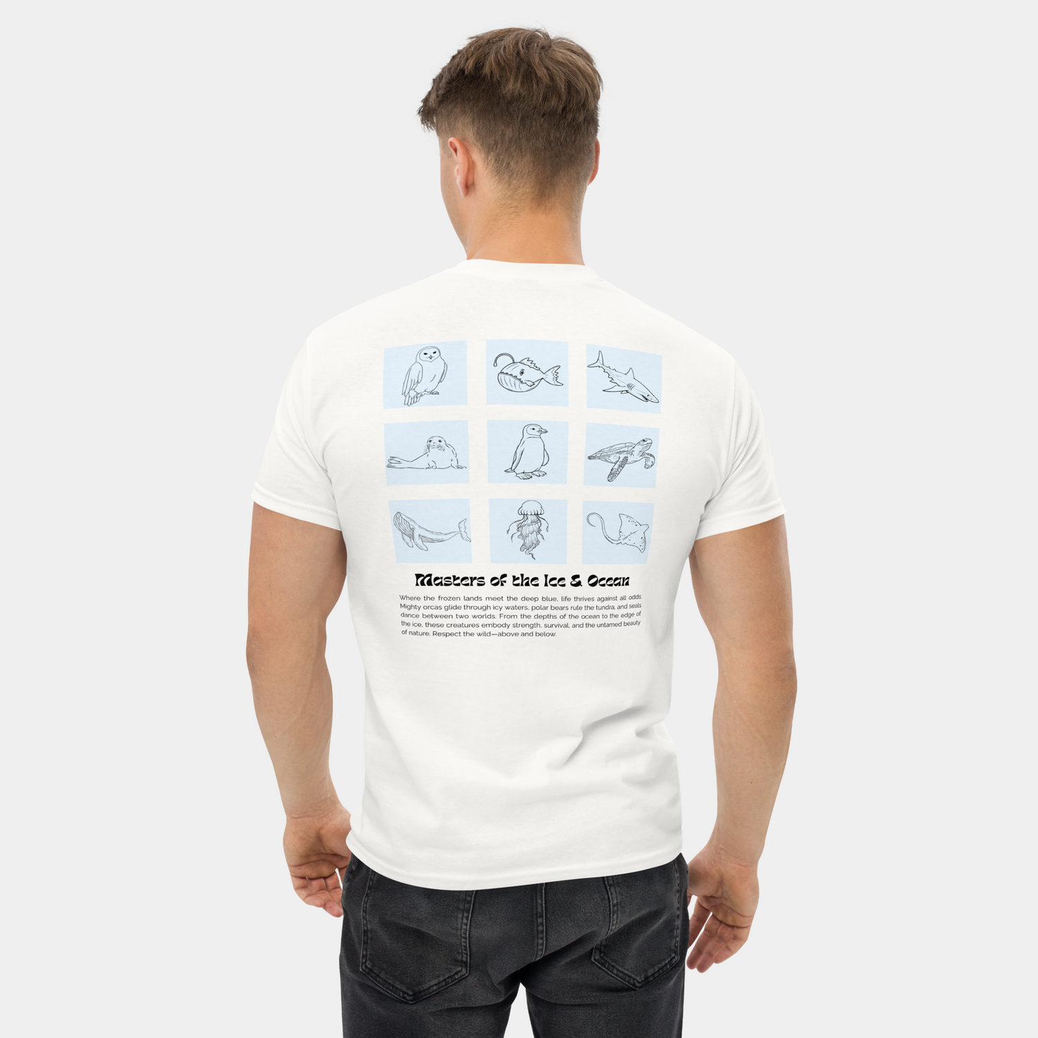 Man wearing the white "Masters of the Ice & Ocean" t-shirt, showing the bluish-green back print with a graphic collage of Arctic and ocean creatures